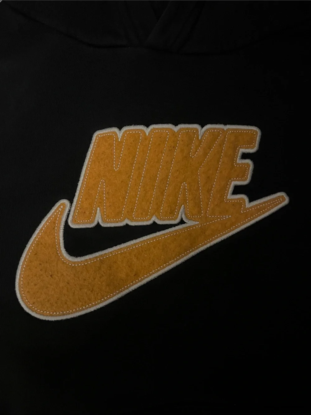 Nike Black Hoodie with Gold Logo Patch